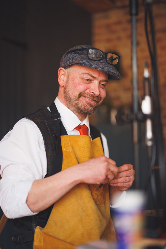 Giles Kozdon demonstrating making your own wedding ring luxury experience at pauntley court wedding venue