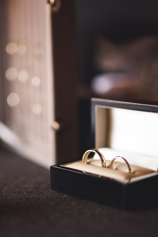 Couples white gold wedding rings in a couples display case at pulteney court wedding venue