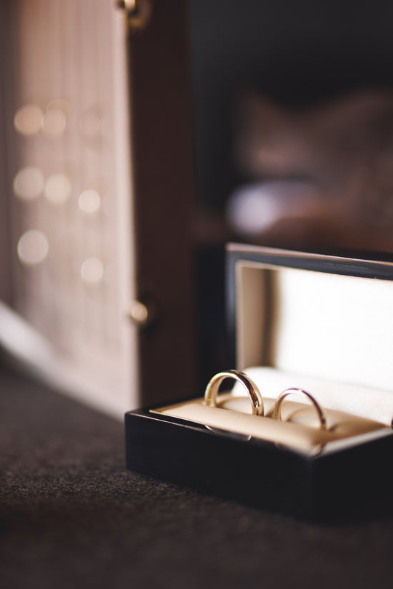Couples white gold wedding rings in a couples display case at pulteney court wedding venue 
